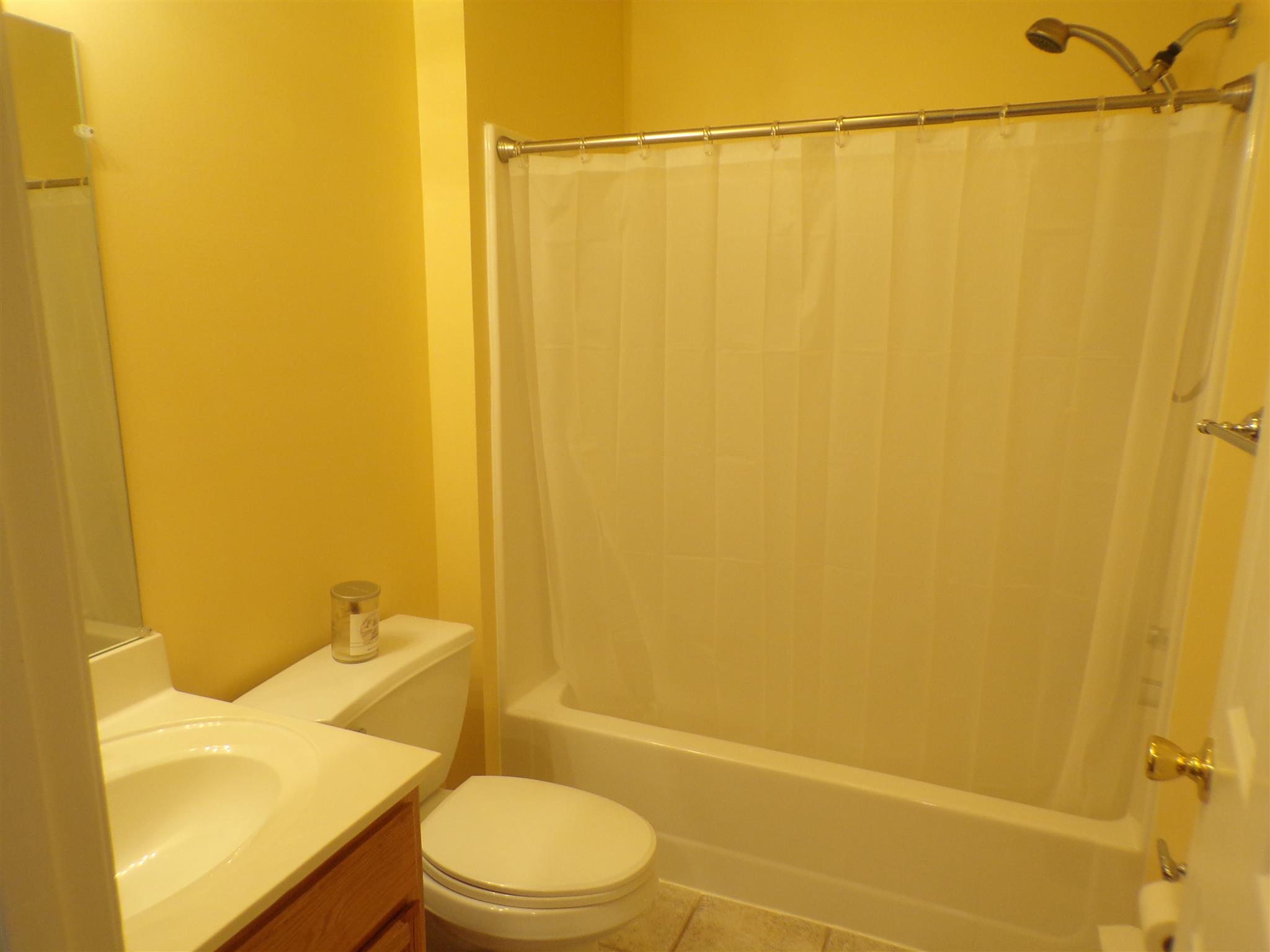 1190 Rhotons Chapel Road Manchester, TN 37355 - Photo 15 of 27 a bathroom with a toilet and shower