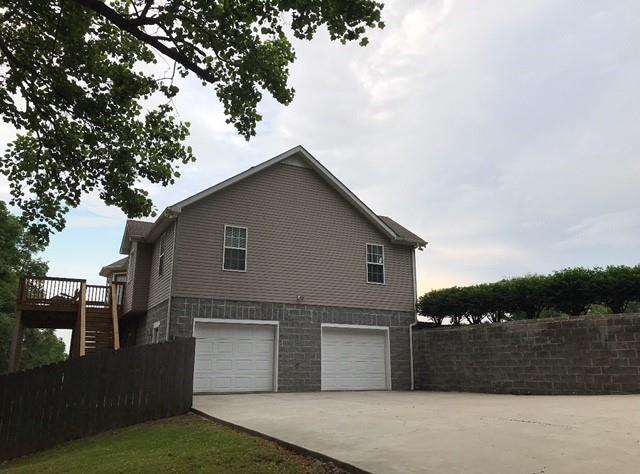 1190 Rhotons Chapel Road Manchester, TN 37355 - Photo 27 of 27 a front view of a house with a yard