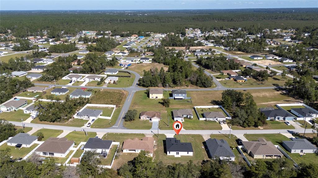 13069 Southwest 35th Circle Ocala, FL 34473 - Photo 4 of 41 an aerial view of residential houses with outdoor space
