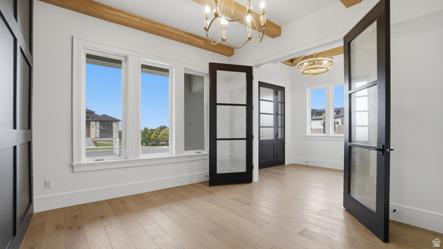 1682 North 1950 W Street, Unit 9 Provo, UT 84604 - Photo 14 of 84 Room featuring wood-finish flooring, exposed wood beams, and multiple windows