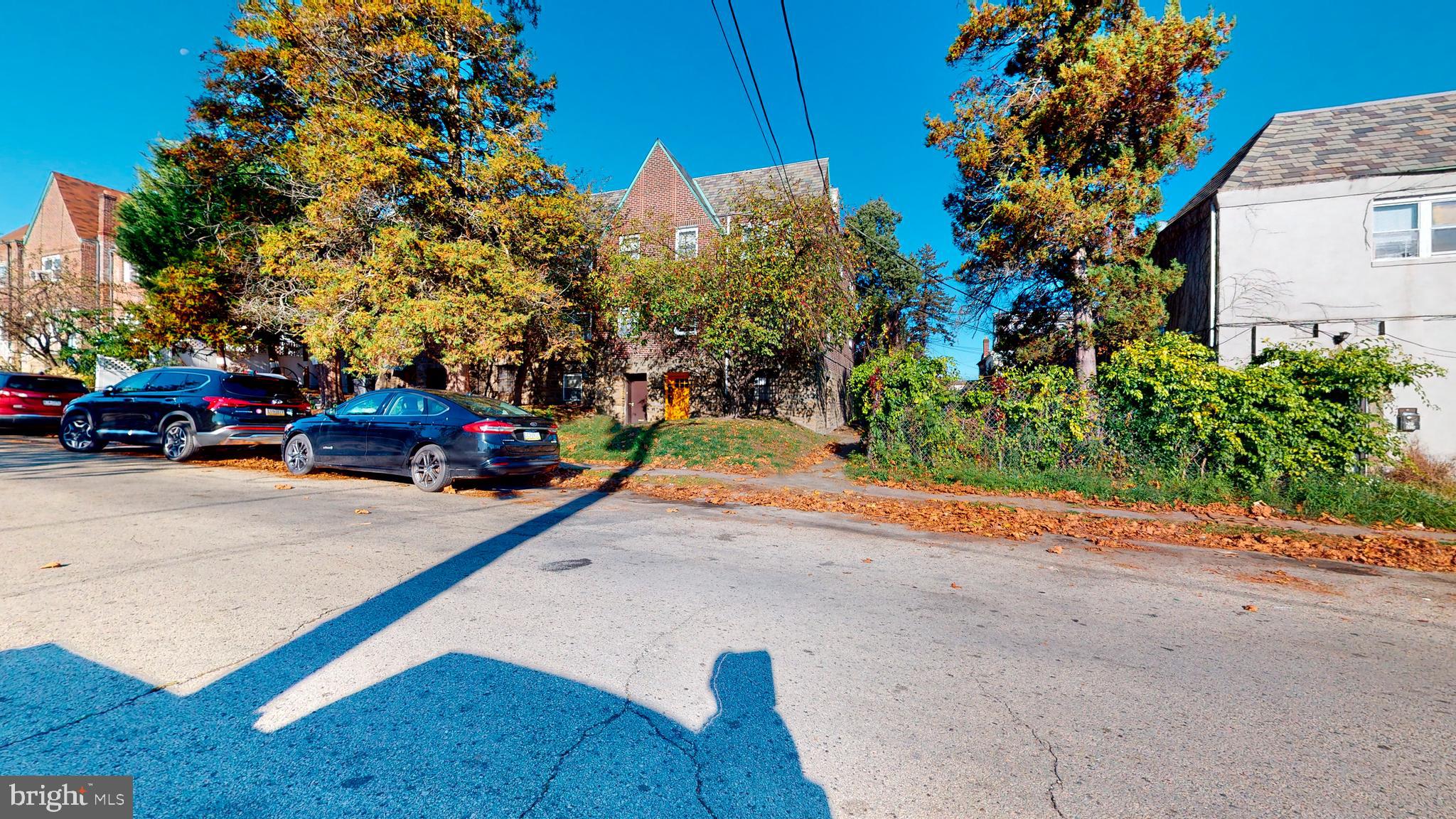 2415 80th Avenue Philadelphia, PA 19150 - Photo 3 of 15 a cars parked on the side of a road