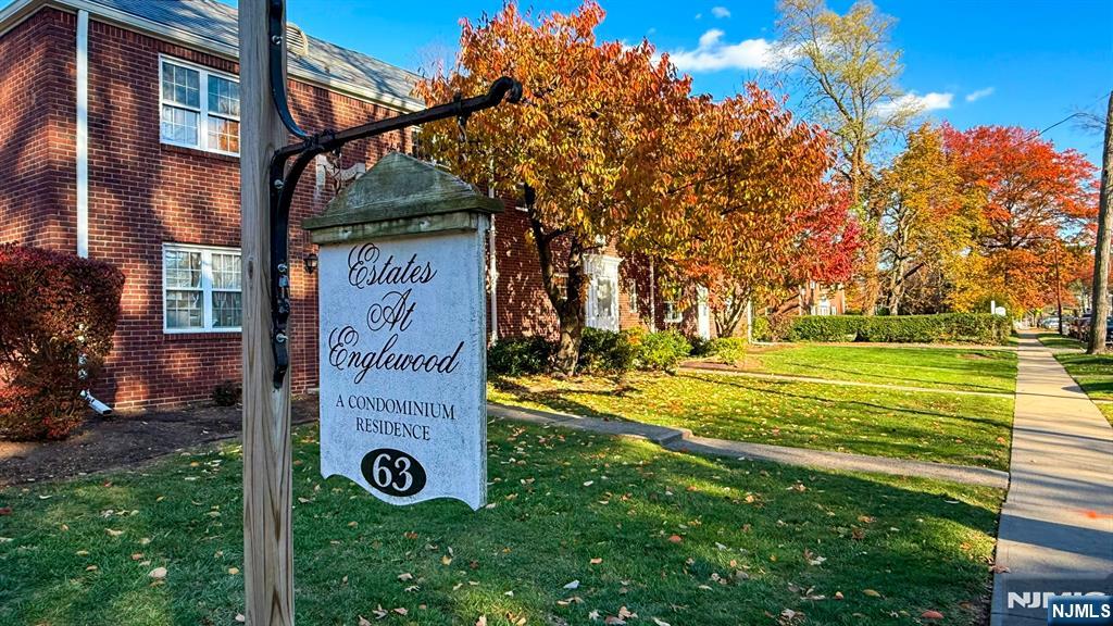 63 West Hudson Avenue, Unit C5 Englewood, NJ 07631 - Photo 18 of 19 a view of a sign board with a big yard