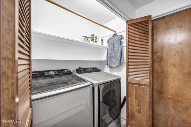 a view of a street with a building in the background