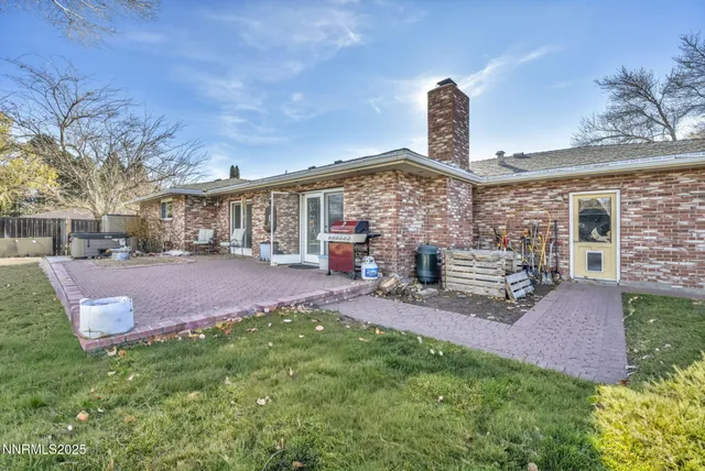 a view of a swimming pool with a patio