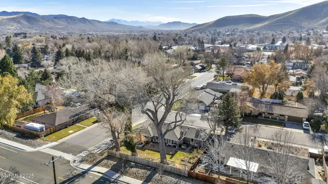 an aerial view of a house with swimming pool