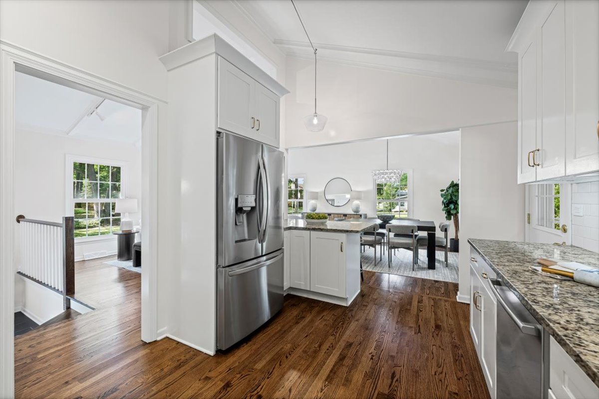 265 Randolph Street Glencoe, IL 60022 - Photo 11 of 34 a kitchen with a refrigerator a stove top oven a sink dishwasher and wooden floor