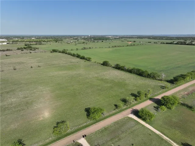 a view of an ocean and mountain