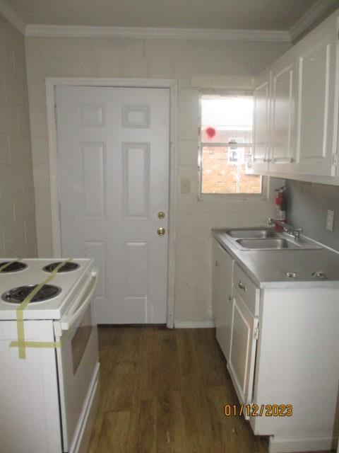3406 Terminal Street, Unit 3 Columbus, GA 31906 - Photo 15 of 30 a kitchen with a sink a stove a refrigerator and cabinets