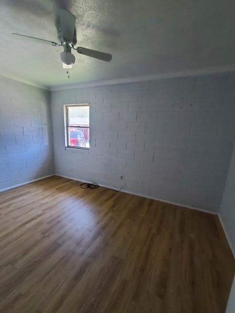 3406 Terminal Street, Unit 3 Columbus, GA 31906 - Photo 27 of 30 an empty room with wooden floor and windows