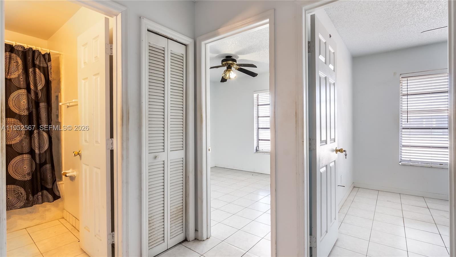 11405 Southwest 148th Terrace Miami, FL 33176 - Photo 14 of 28 a view of a bathroom with a shower and a sink