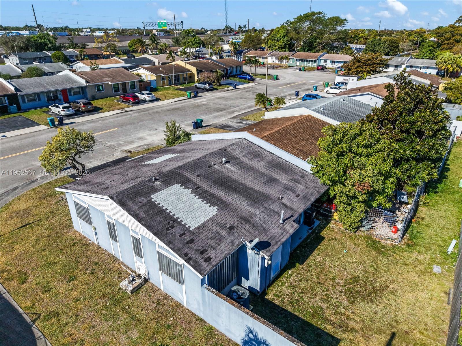 11405 Southwest 148th Terrace Miami, FL 33176 - Photo 26 of 28 a view of a house with a terrace