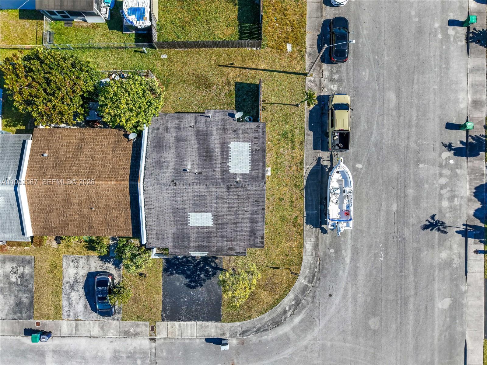 11405 Southwest 148th Terrace Miami, FL 33176 - Photo 28 of 28 aerial view of a house with a garden and plants