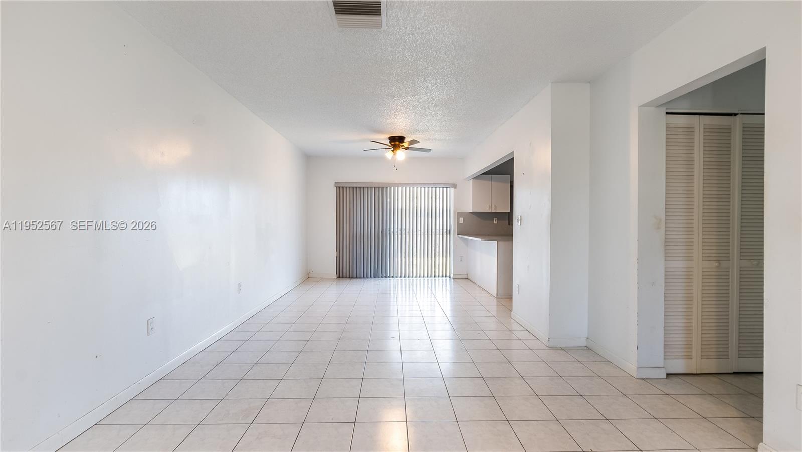 11405 Southwest 148th Terrace Miami, FL 33176 - Photo 7 of 28 a view of an empty room and window