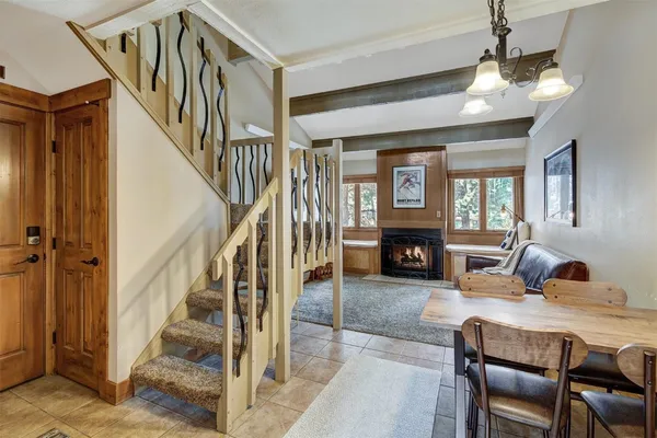 a view of a livingroom with furniture and a fireplace