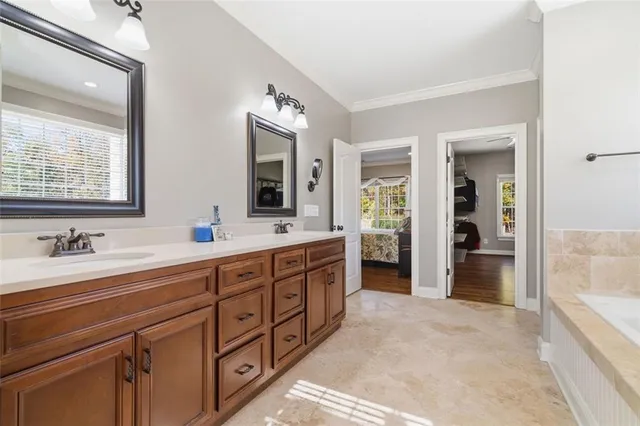 a view of kitchen with wooden floor and electronic appliances
