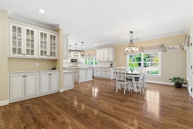 a view of a livingroom with furniture and a fireplace