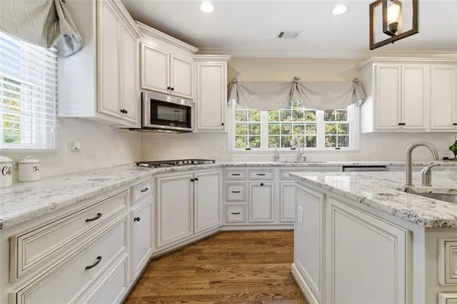 a view of a backyard with sitting area