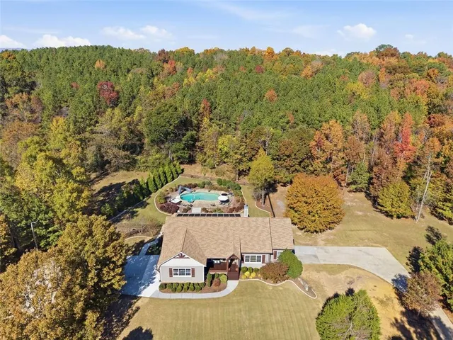 a outdoor space with patio the couches and a potted plant on a table