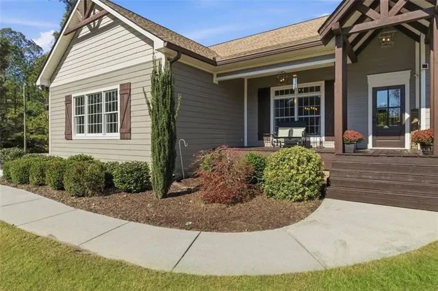 a spacious bedroom with a bed and a couch