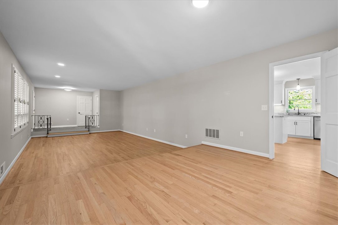 103 Satula Lane Clemson, SC 29631 - Photo 18 of 50 Bright and airy interior space, boasting gleaming hardwood floors and ample natural light.