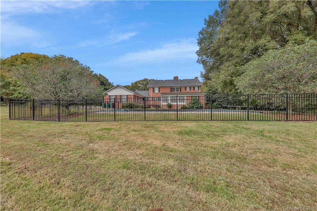 3319 Sharon Road Charlotte, NC 28211 - Photo 4 of 9 a view of a green field
