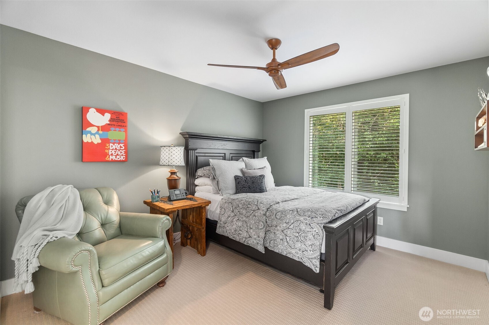 9044 Hunter Point Road Northwest Olympia, WA 98502 - Photo 21 of 40 a bed room with a bed and a couch