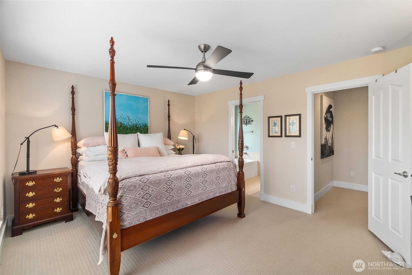 9044 Hunter Point Road Northwest Olympia, WA 98502 - Photo 24 of 40 a bedroom with a bed and a dresser