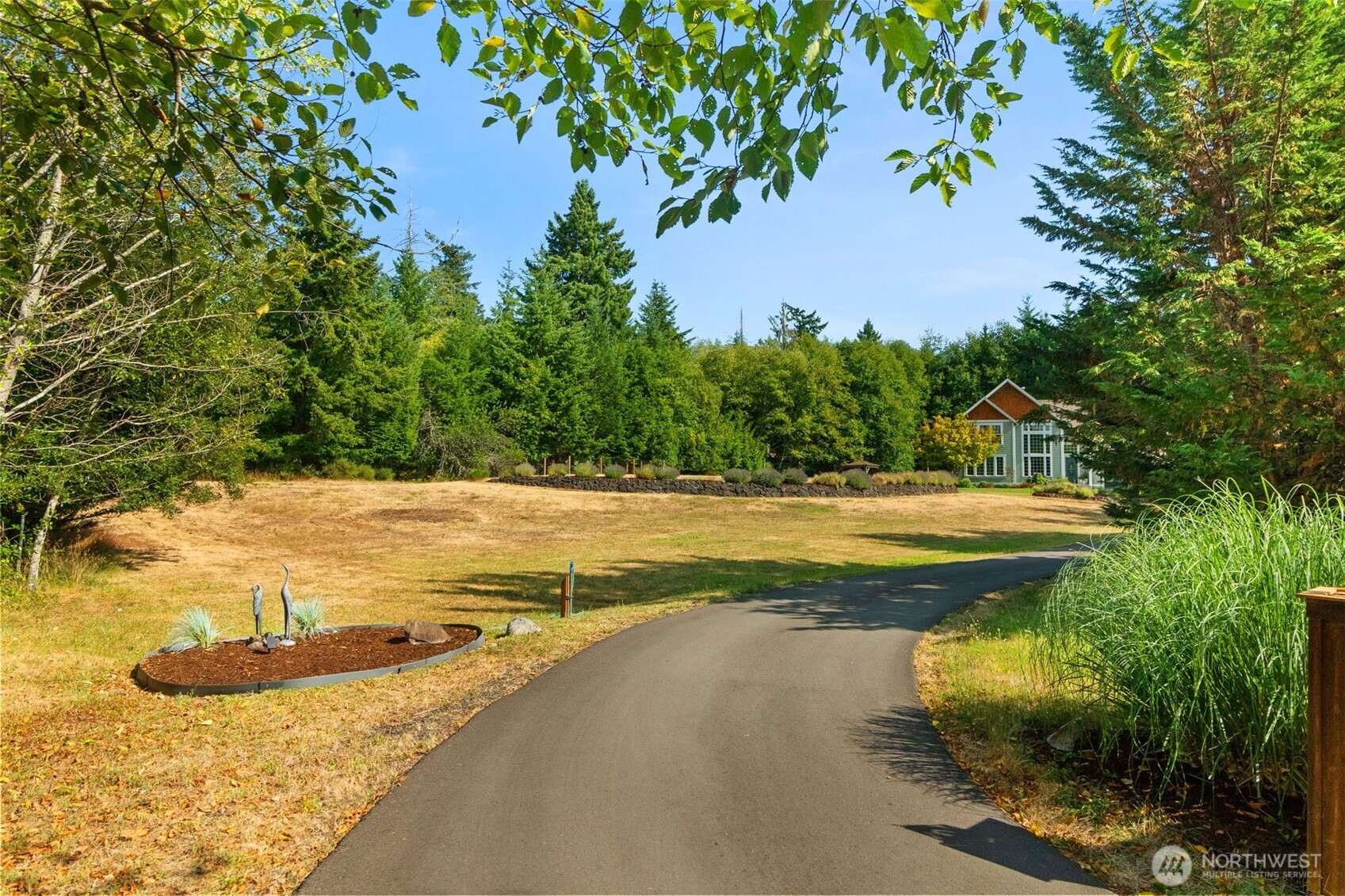 9044 Hunter Point Road Northwest Olympia, WA 98502 - Photo 34 of 40 a view of a swimming pool with an outdoor space