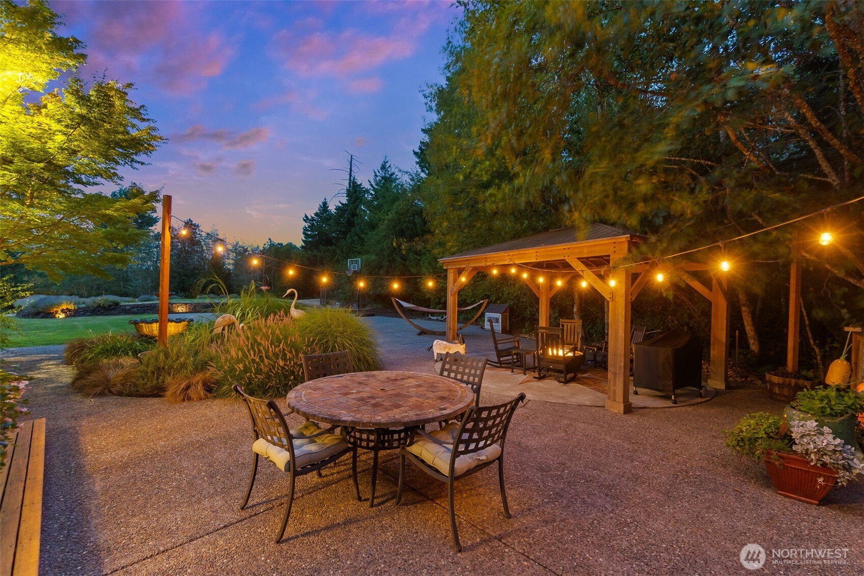 9044 Hunter Point Road Northwest Olympia, WA 98502 - Photo 39 of 40 a view of a tables and chairs in patio