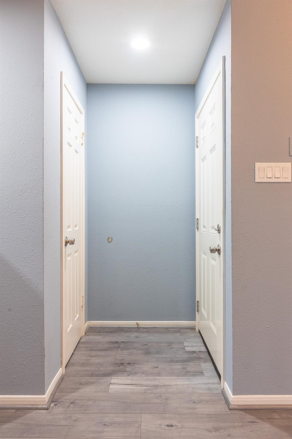 14600 Fonmeadow Drive, Unit 107 Houston, TX 77035 - Photo 3 of 27 a view of an empty room with wooden floor and a window