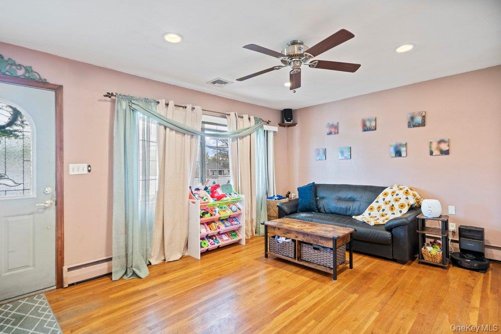 101 Sexton Road West Babylon, NY 11704 - Photo 7 of 33 a living room with furniture and a window