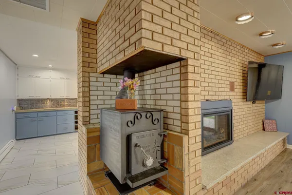 a view of yard with patio