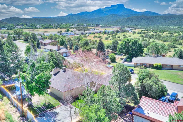 a bathroom with a sink a toilet and bathtub
