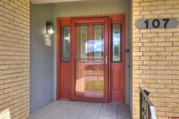 a stove top oven sitting inside of a kitchen