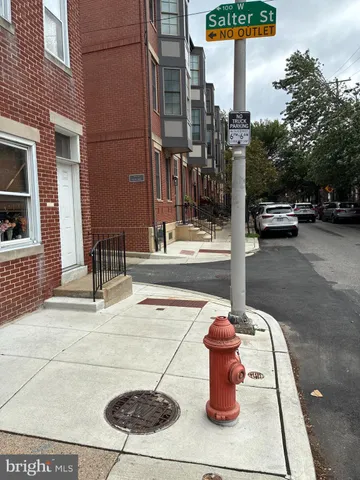 a view of a street with cars