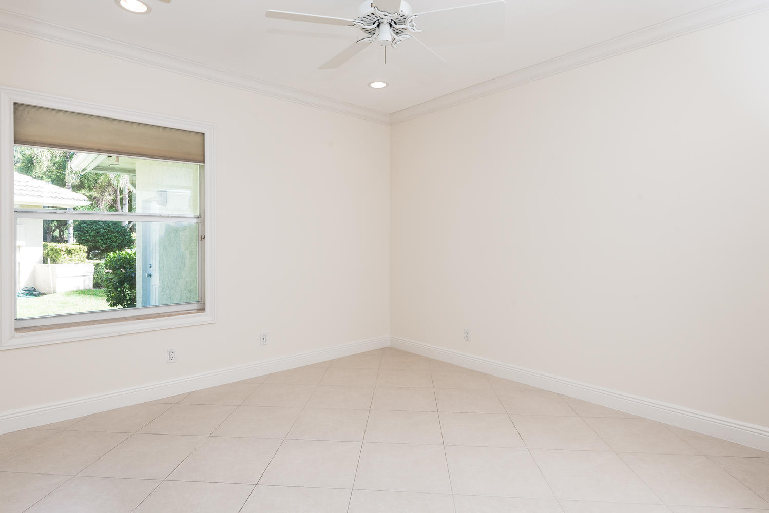 2245 Parkside Street Boca Raton, FL 33486 - Photo 21 of 34 an empty room with a window