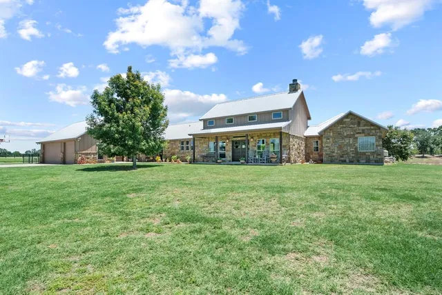 a front view of house with yard