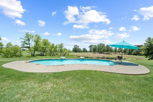 a view of a playground with basketball court