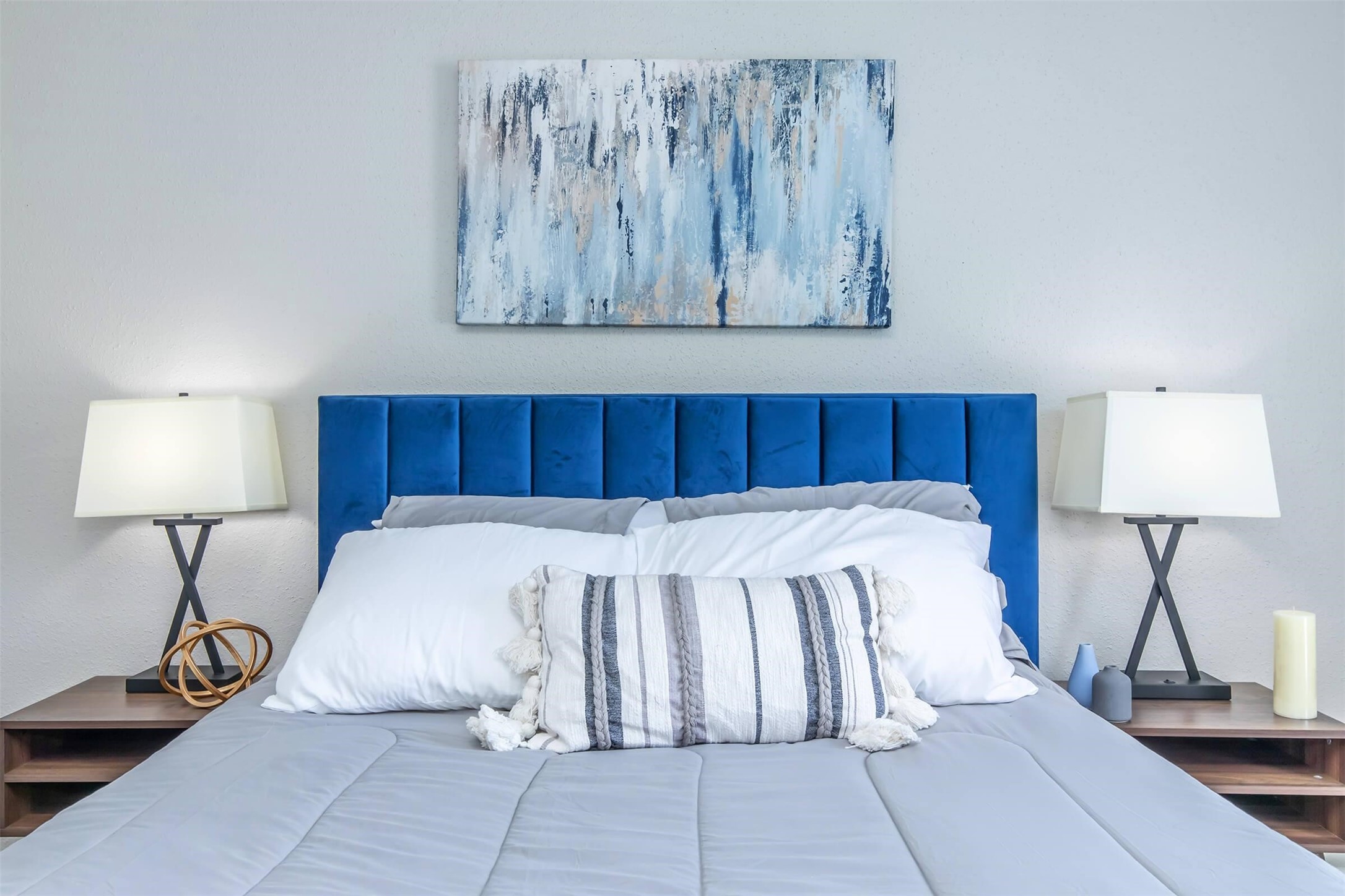 18001 Cypress Trace Road, Unit 102 Houston, TX 77090 - Photo 10 of 32 a bed room with a bed and a lamp