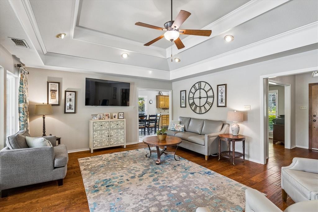 404 Moonlight Lane Keller, TX 76248 - Photo 10 of 40 a living room with furniture and a flat screen tv