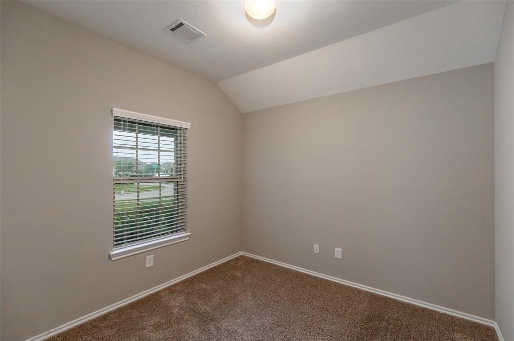3511 Goldleaf Trail Drive Katy, TX 77449 - Photo 13 of 21 an empty room with windows