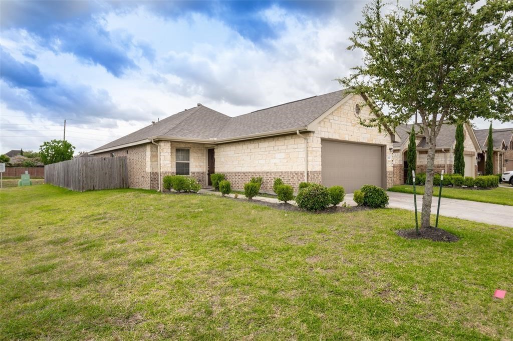 3511 Goldleaf Trail Drive Katy, TX 77449 - Photo 2 of 21 a front view of house with yard and green space