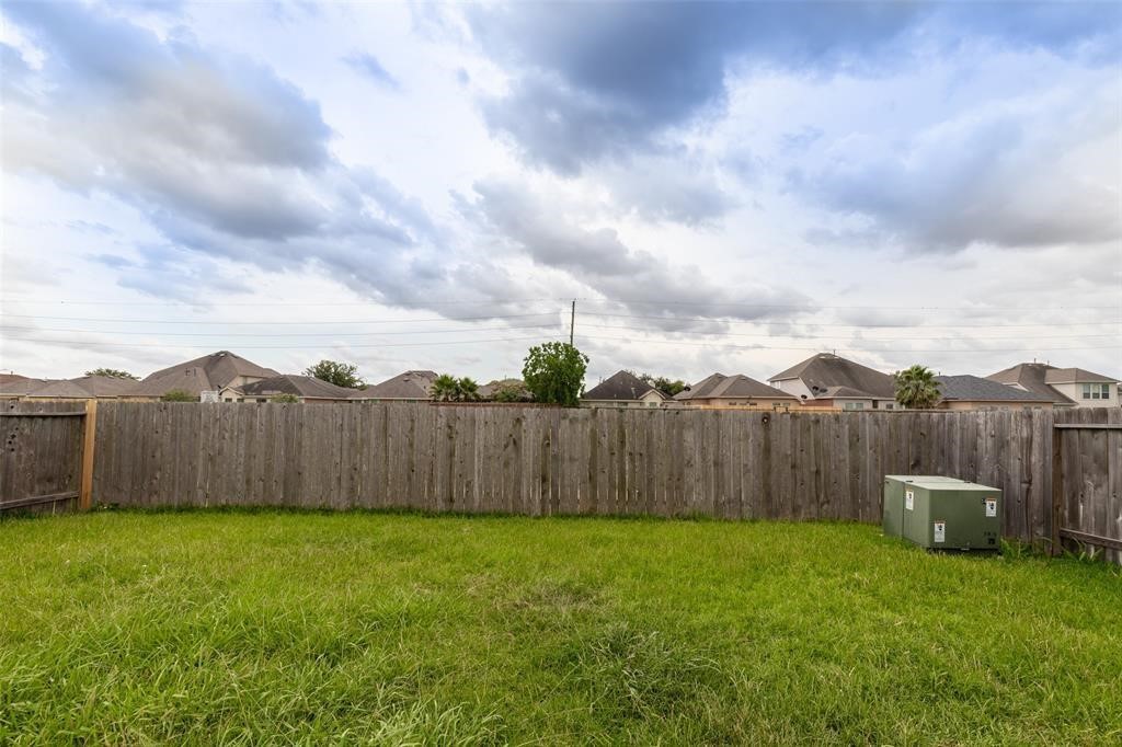 3511 Goldleaf Trail Drive Katy, TX 77449 - Photo 21 of 21 a view of a backyard with barn