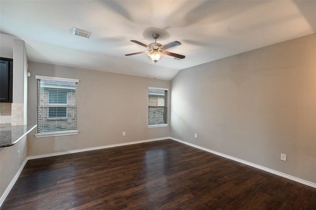 3511 Goldleaf Trail Drive Katy, TX 77449 - Photo 6 of 21 wooden floor in an empty room with a window