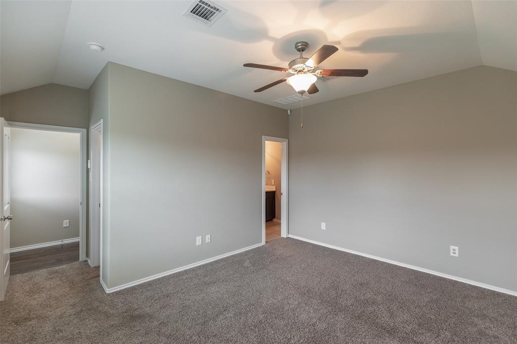 3511 Goldleaf Trail Drive Katy, TX 77449 - Photo 9 of 21 a view of an empty room with a fan