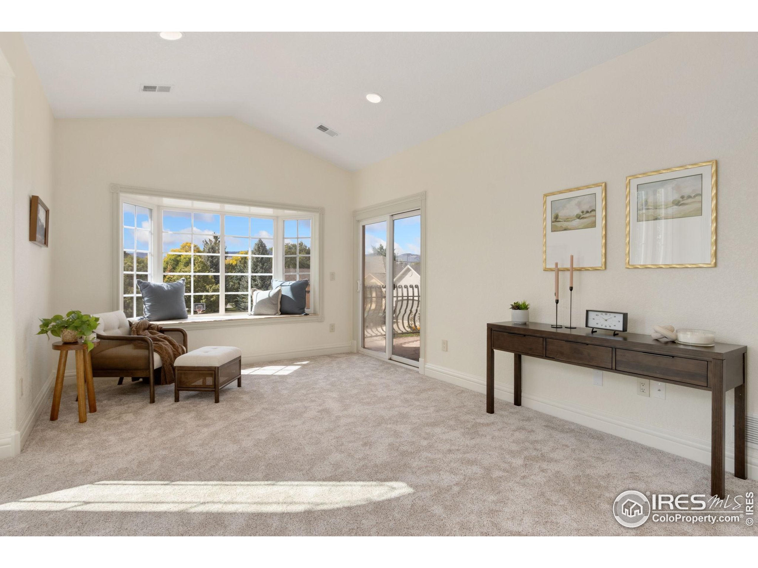3908 Westfield Court Fort Collins, CO 80526 - Photo 20 of 45 a living room with furniture and a window