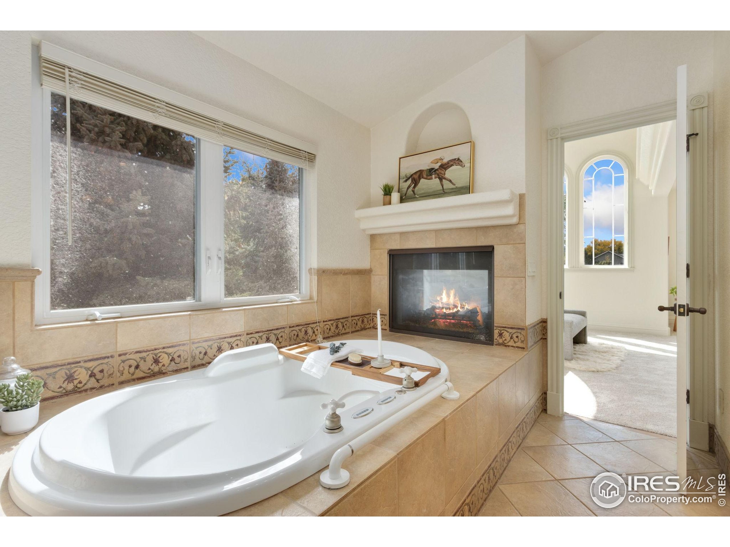 3908 Westfield Court Fort Collins, CO 80526 - Photo 24 of 45 a bathroom with a sink and a mirror