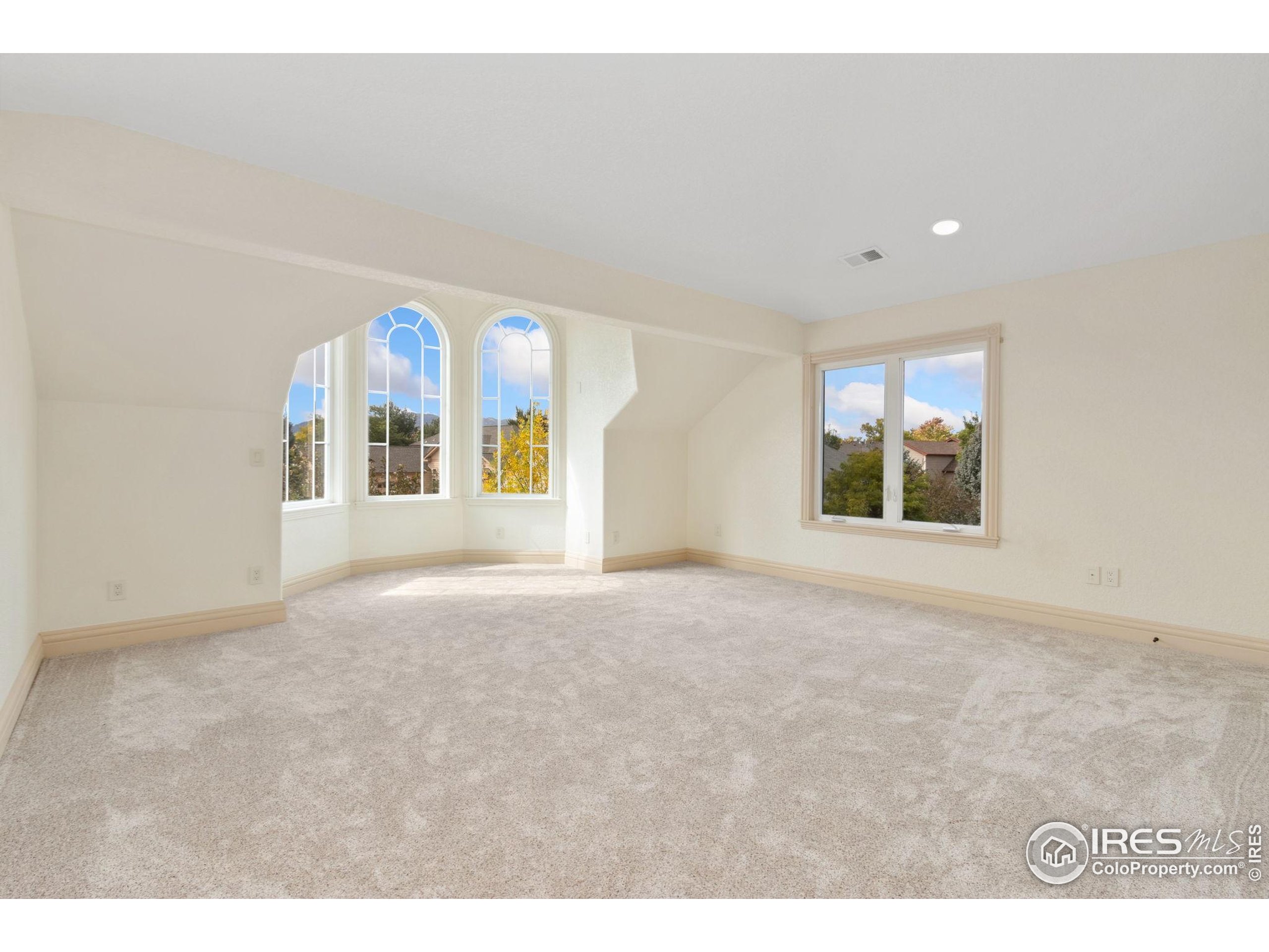 3908 Westfield Court Fort Collins, CO 80526 - Photo 25 of 45 a view of an empty room with a window