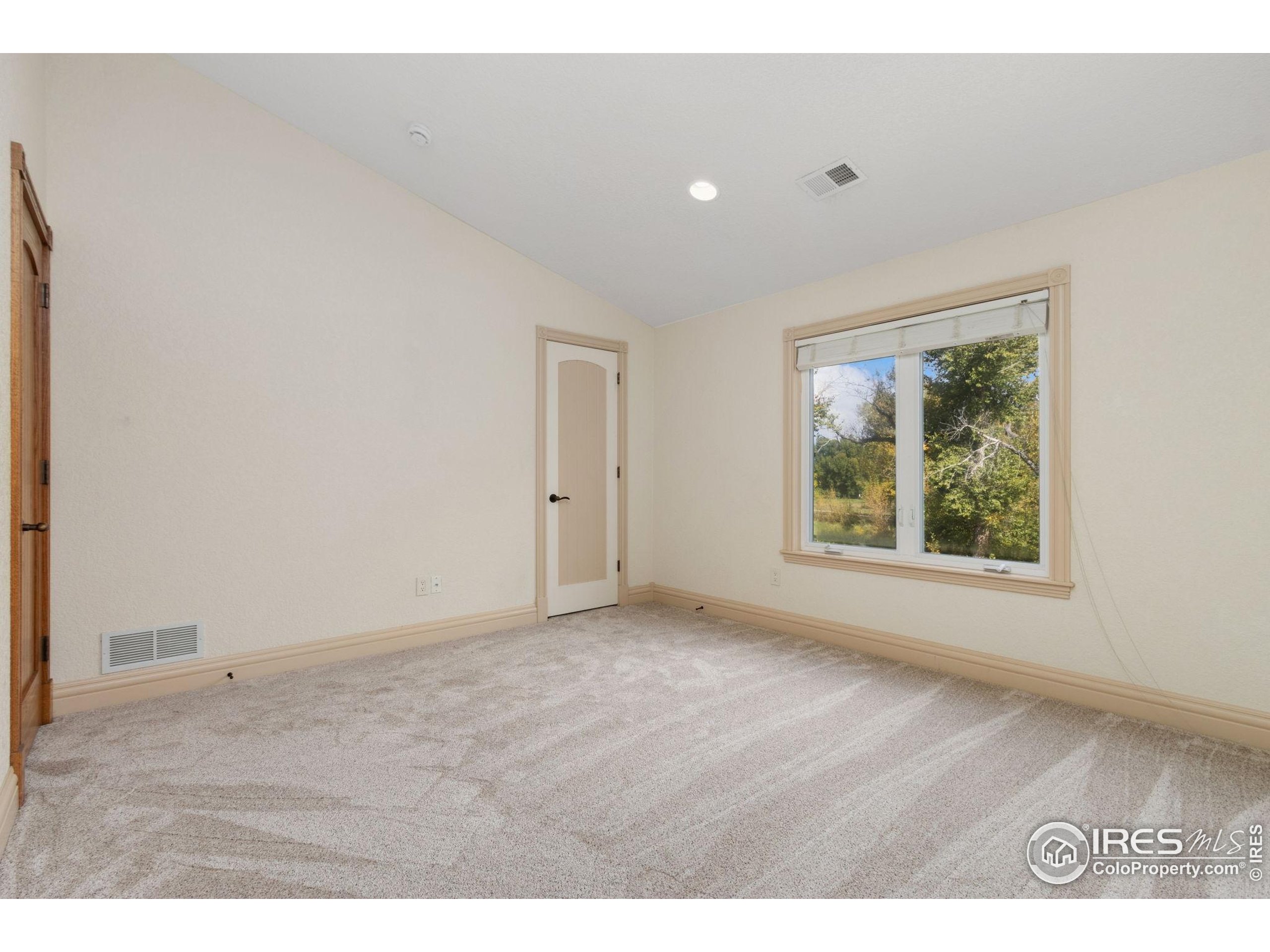3908 Westfield Court Fort Collins, CO 80526 - Photo 28 of 45 a view of an empty room with a window