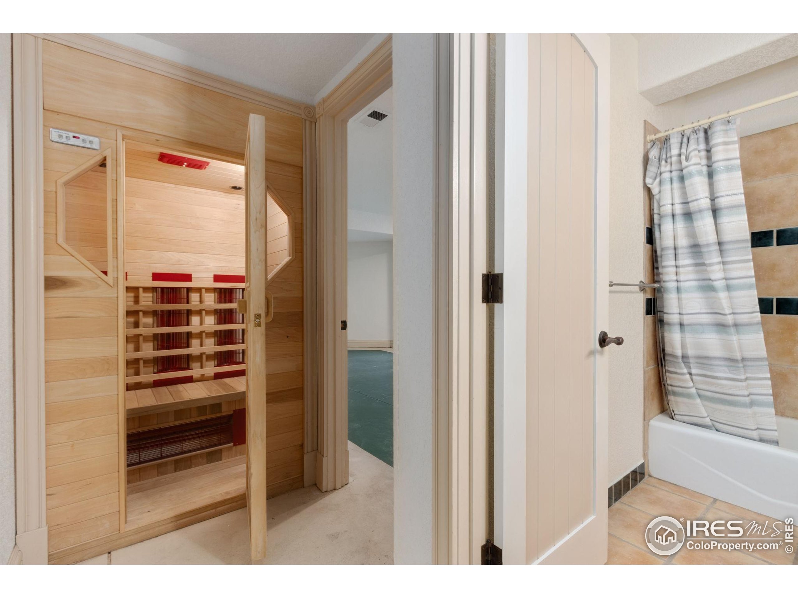 3908 Westfield Court Fort Collins, CO 80526 - Photo 33 of 45 a view of walk in closet with empty racks